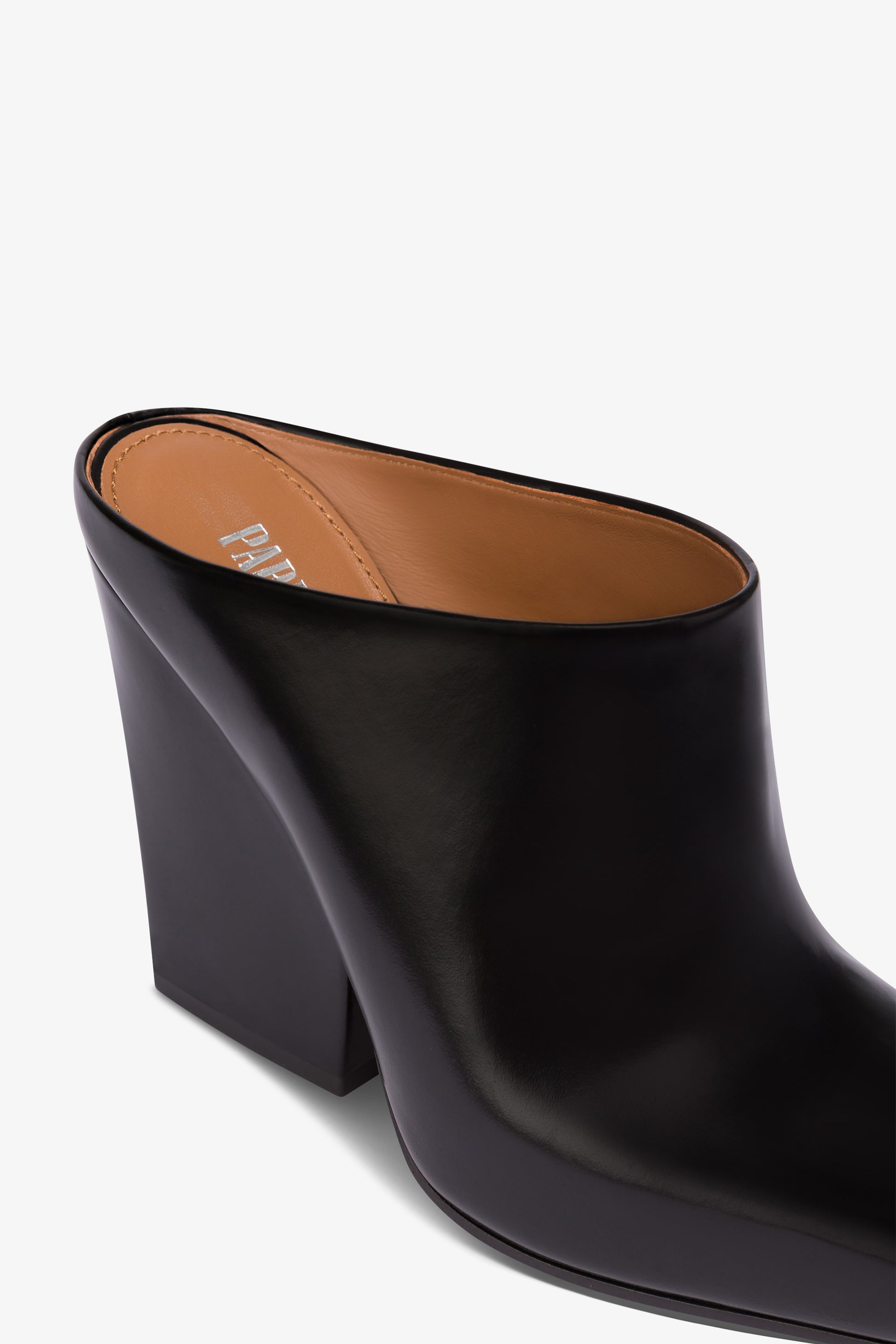 Long, pointed mule boots in soft black brushed leather