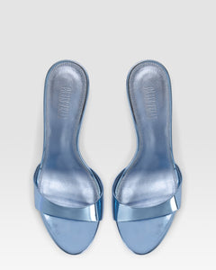 Mules in denim-colored, mirror-effect leather