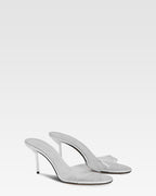 Almond-toe mules in supple silver PVC-mirror leather