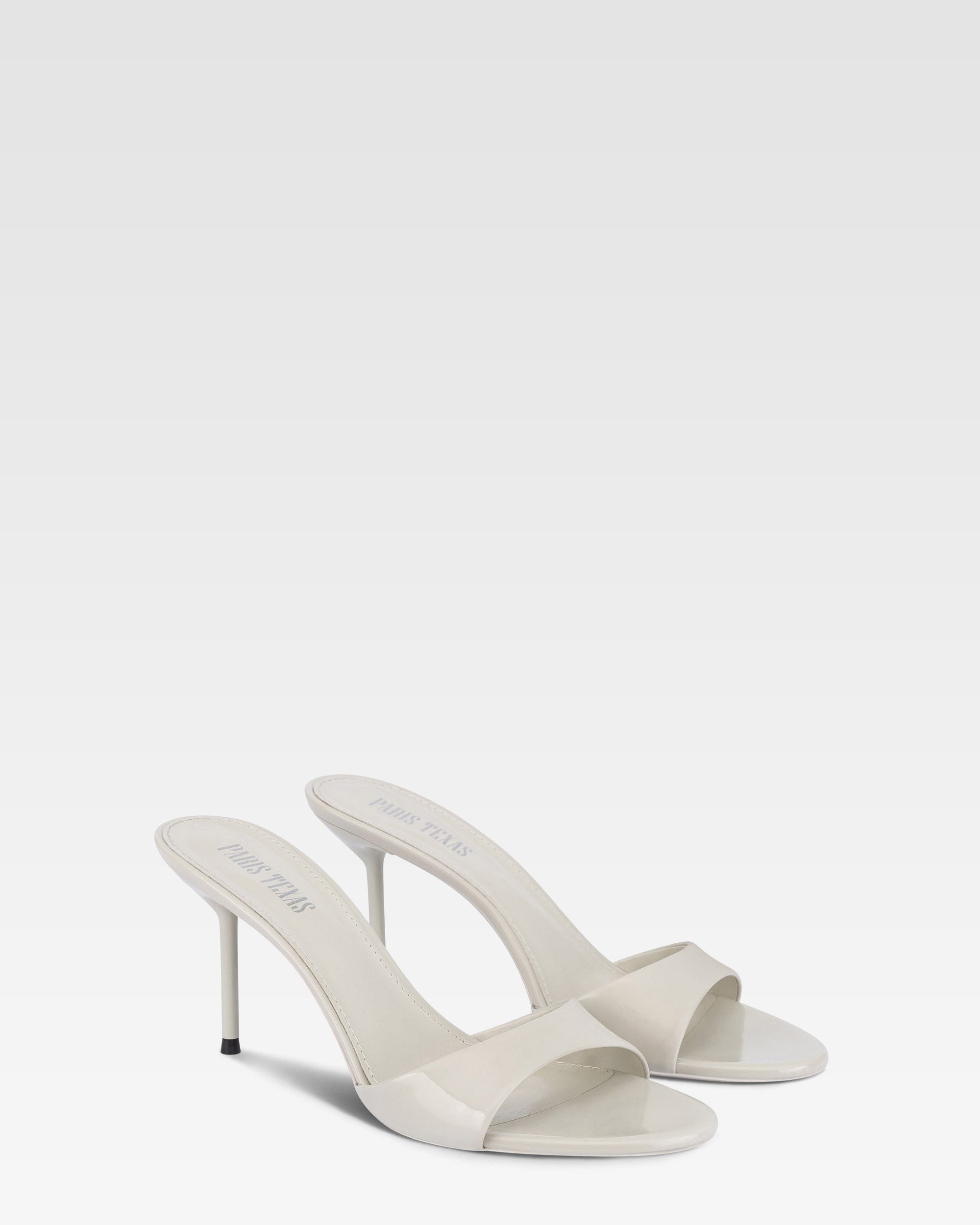 Mules in grey patent leather
