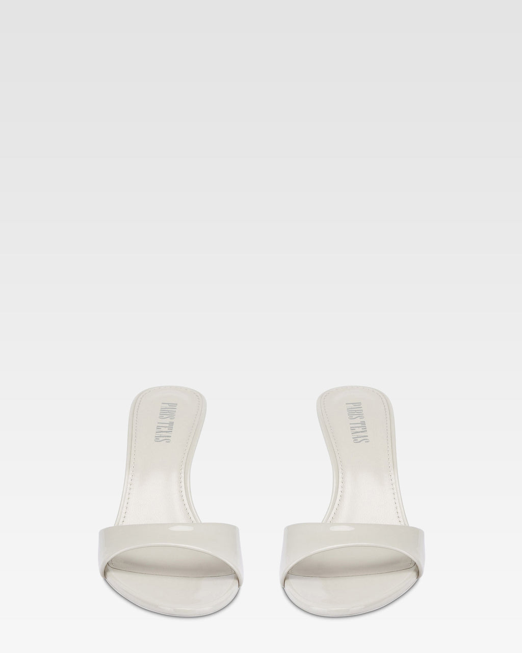 Mules in grey patent leather