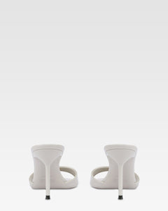 Mules in grey patent leather