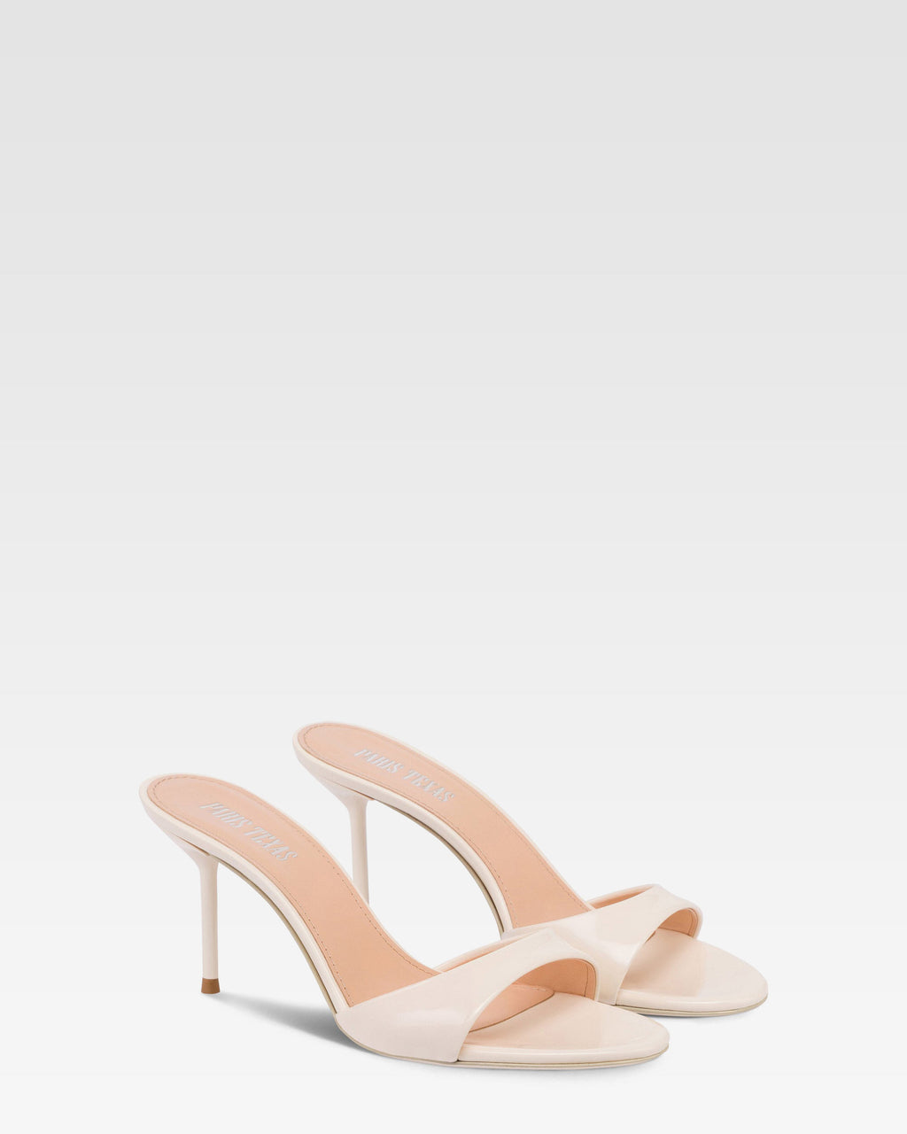 Mules en charol marfil