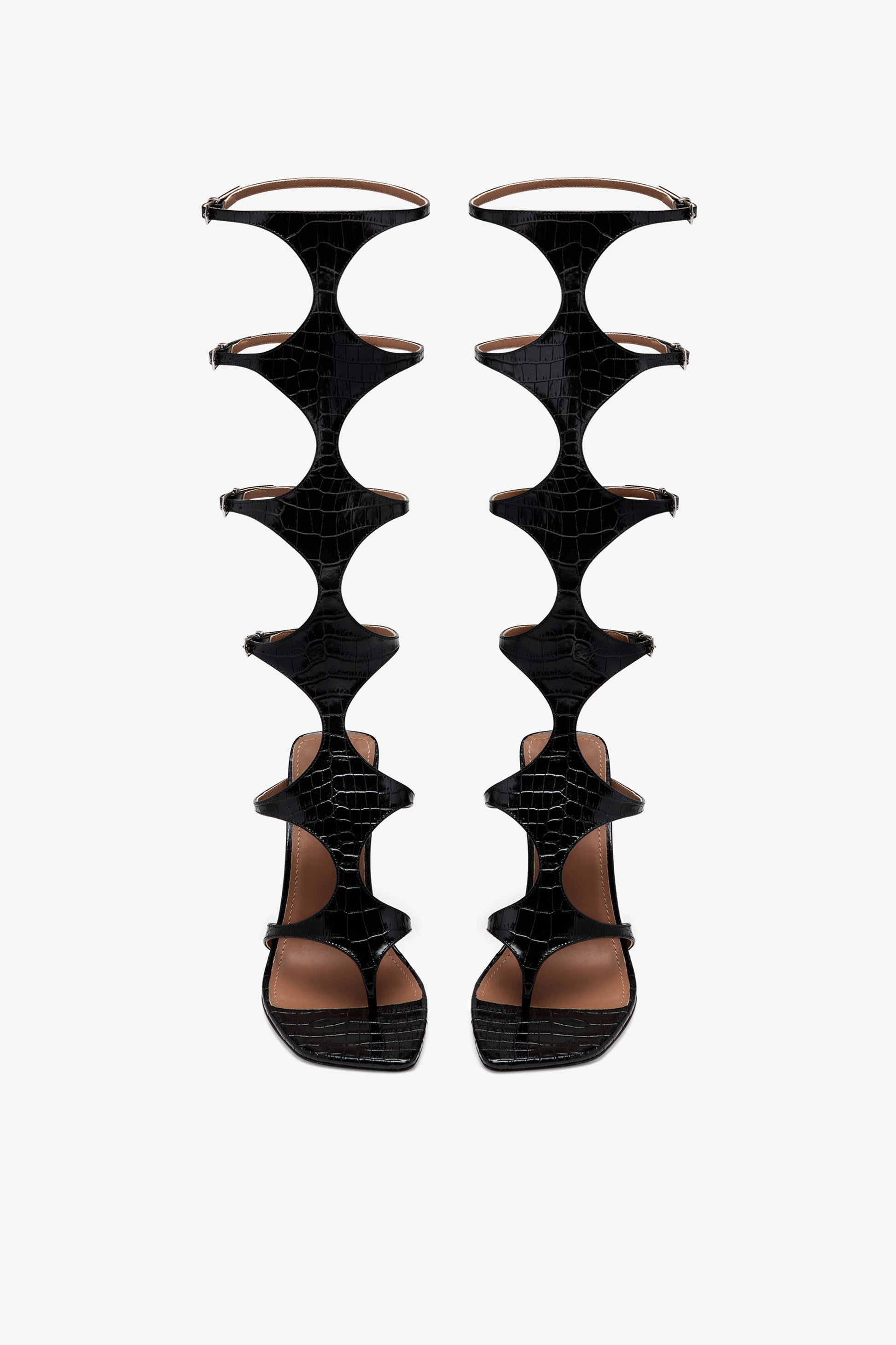 Black embossed leather knee-high sandal