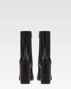 Bottines pointues en cuir lisse noir