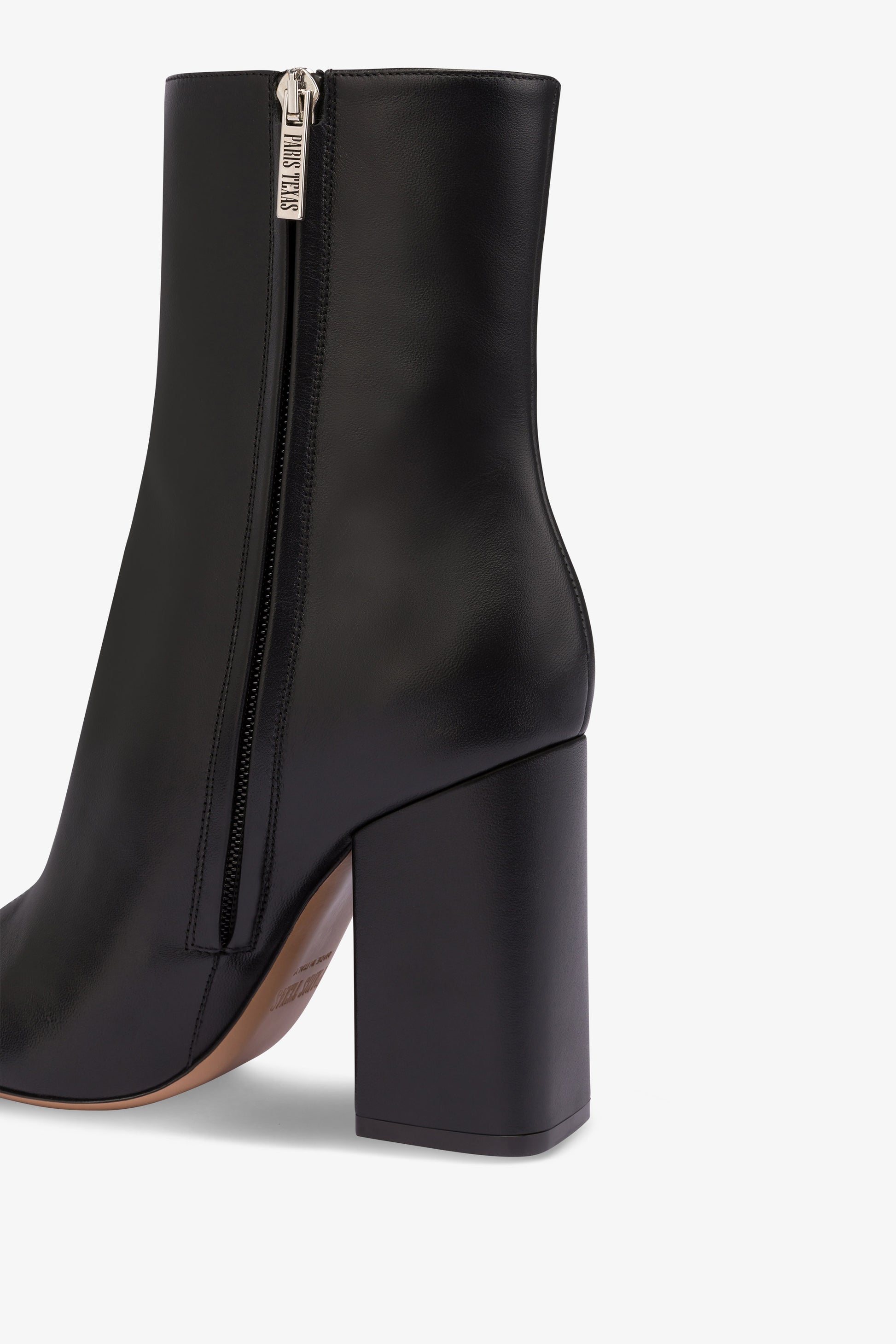 Pointed ankle boots in smooth black leather