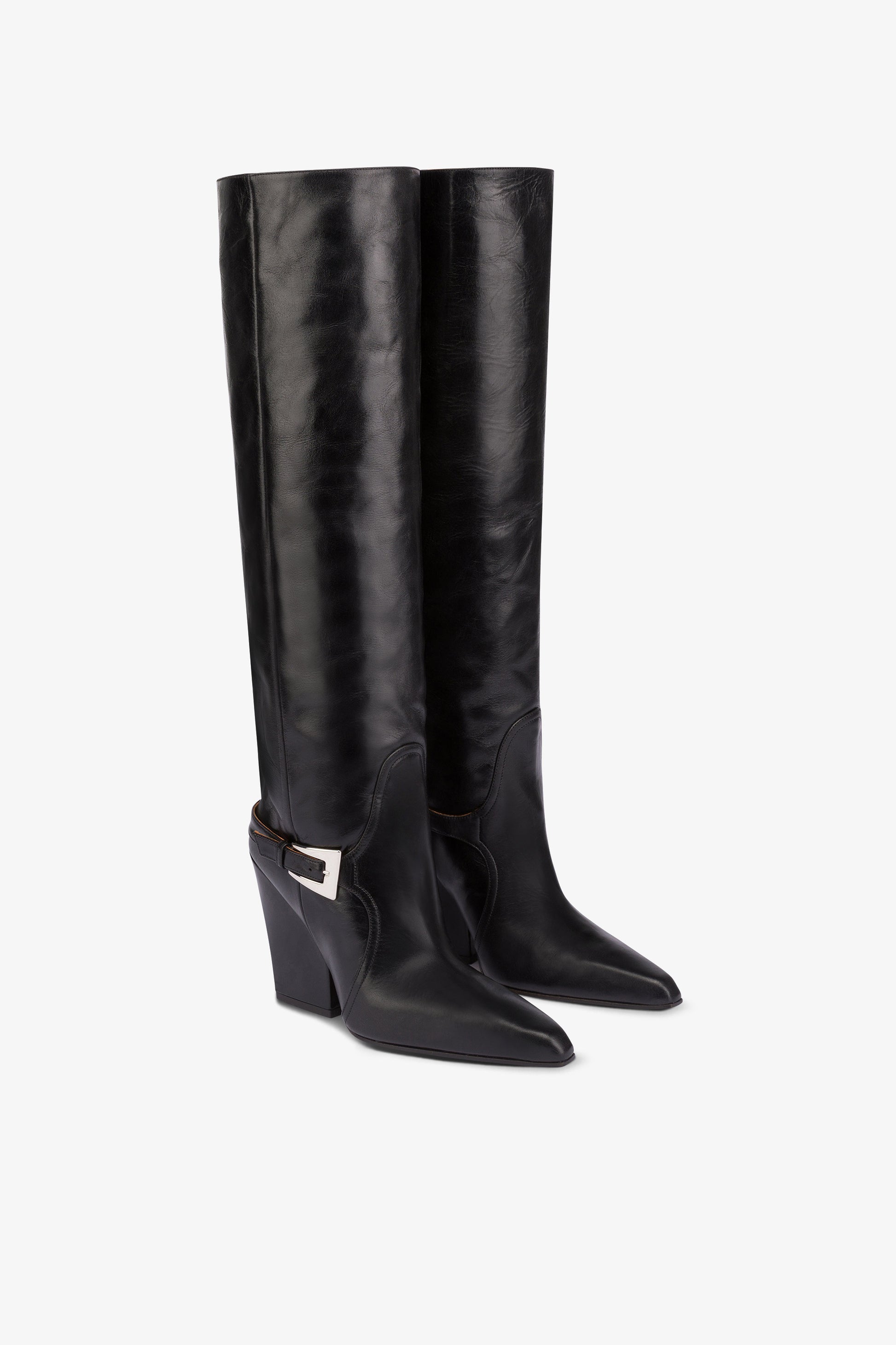 Tall, knee-high boots in shiny black vintage leather