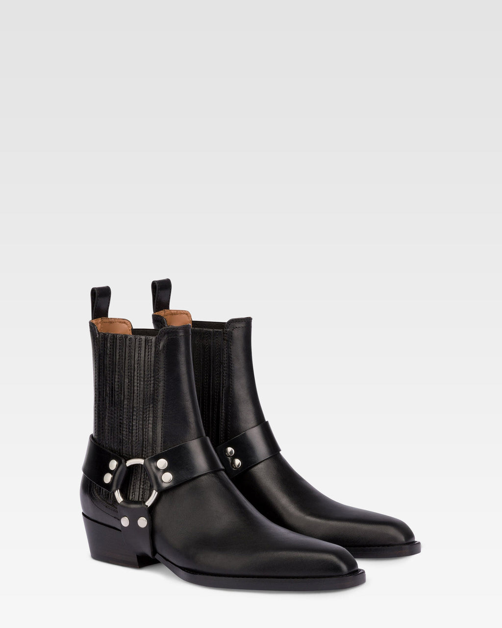 Spitz zulaufende Stiefeletten aus glanzendem, schwarzem Vintage-Leder