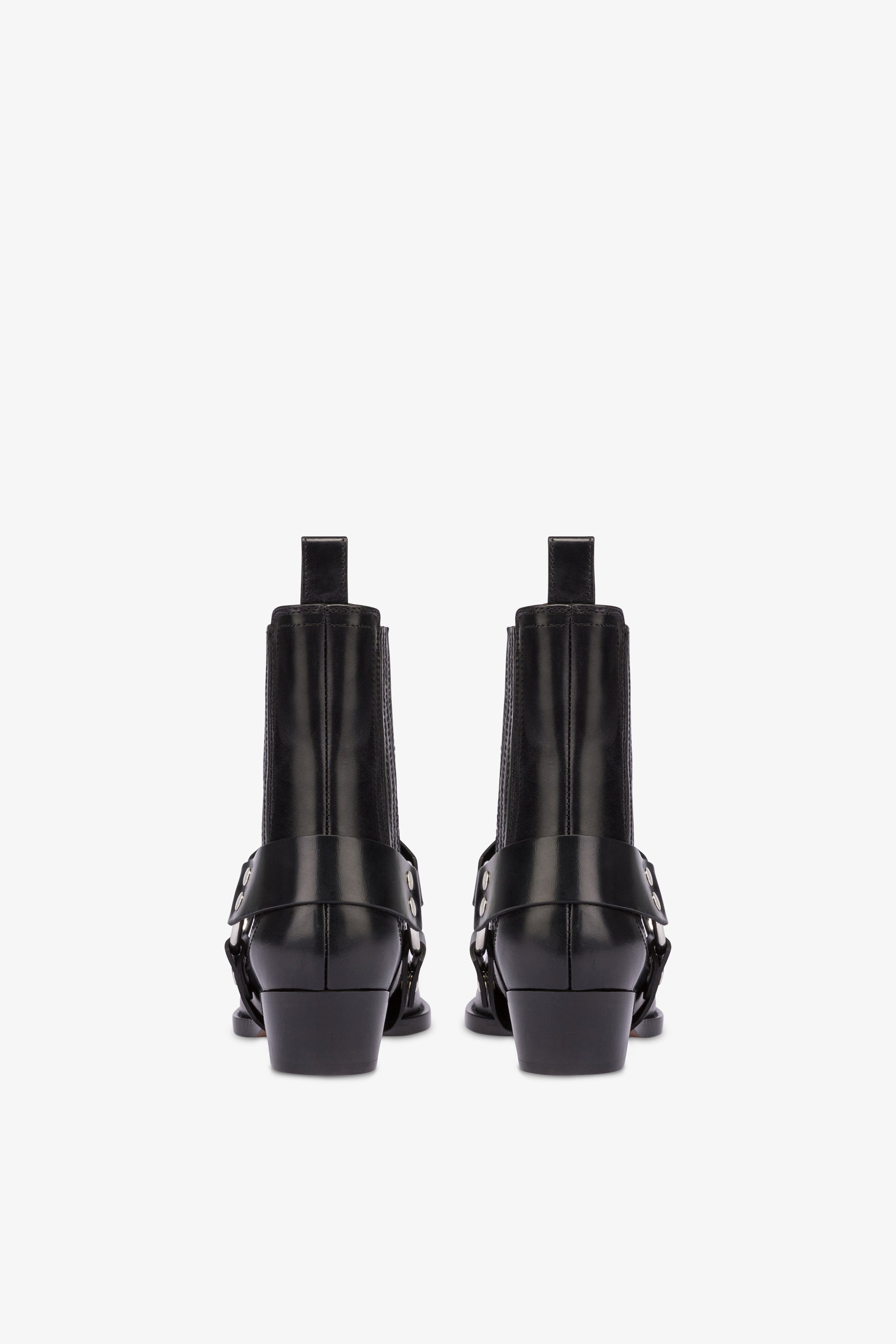 Pointed ankle boots in shiny black vintage leather