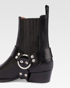 Spitz zulaufende Stiefeletten aus glanzendem, schwarzem Vintage-Leder