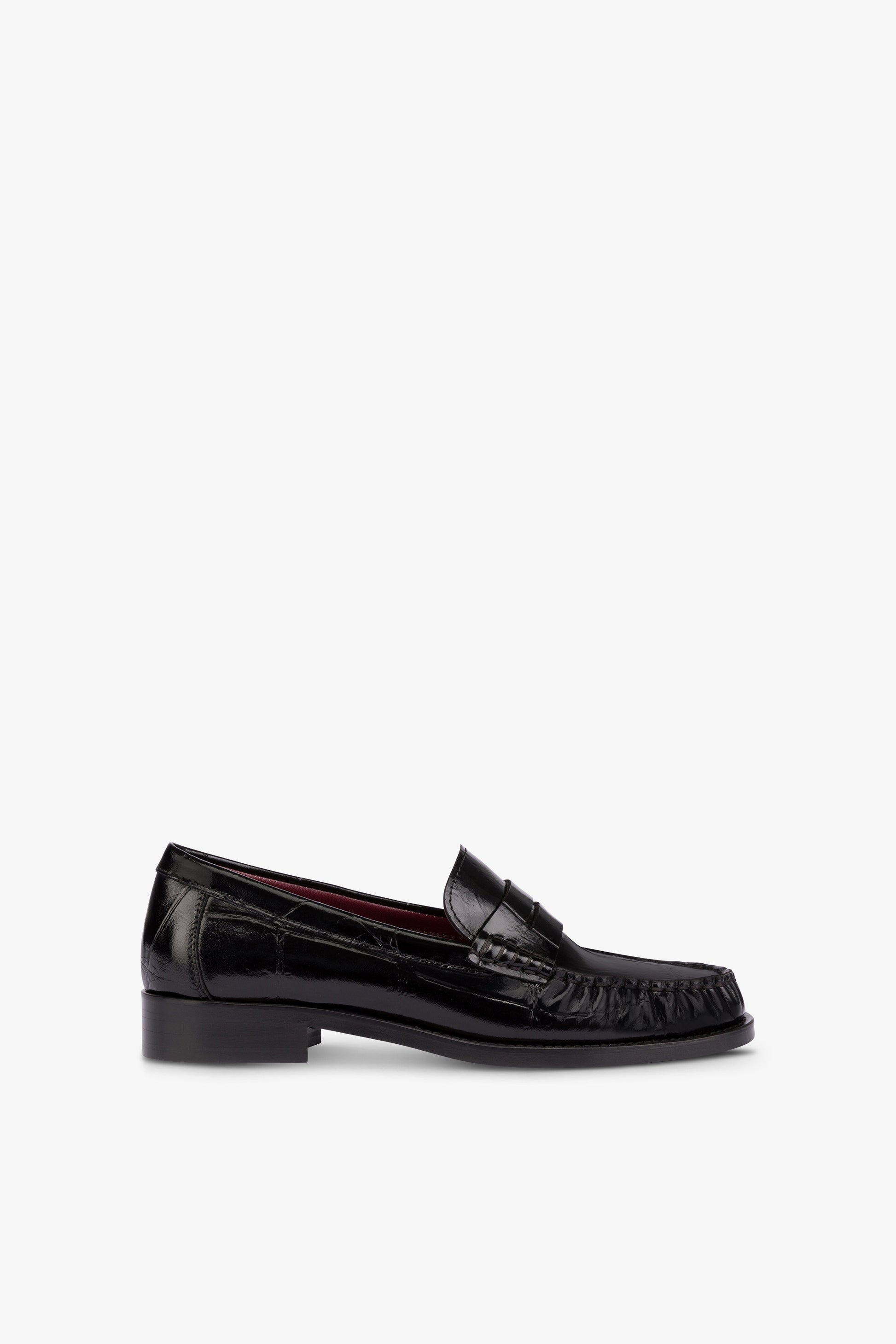 Loafer shoes in black maxi croco-embossed leather