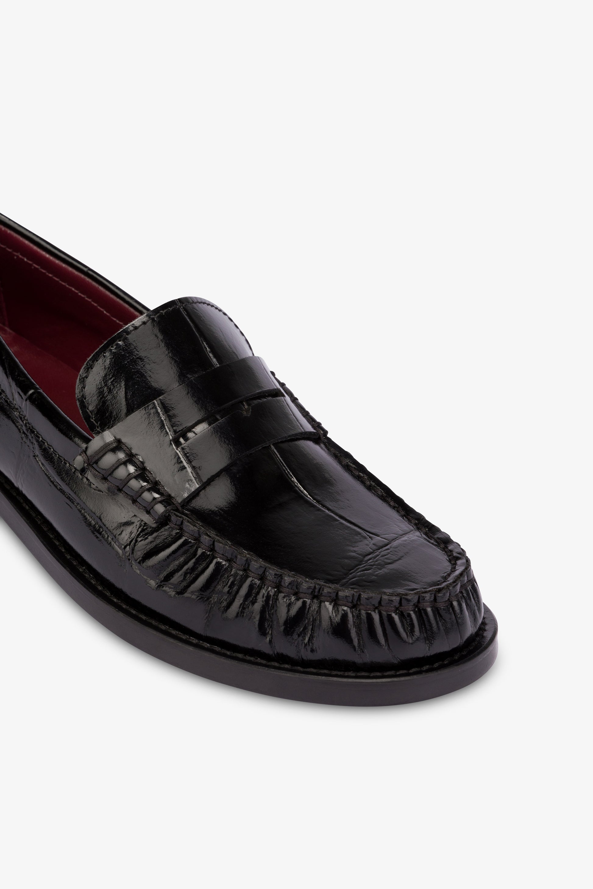 Loafer aus schwarzem Leder mit Maxi-Kroko-Pragung