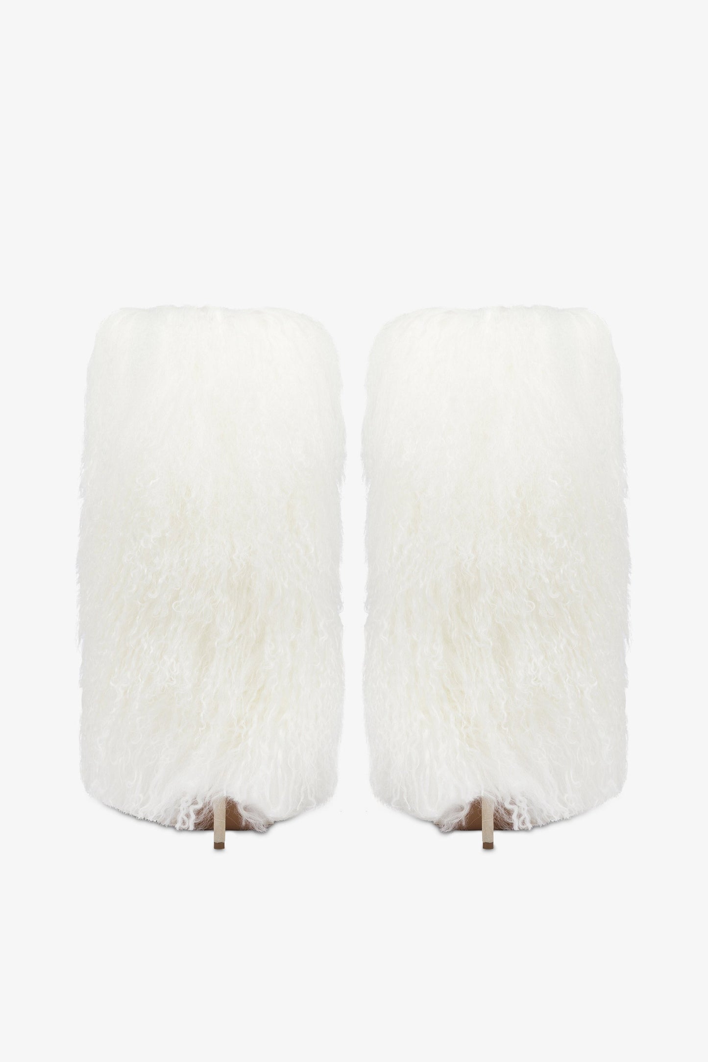 Boots in white faux fur