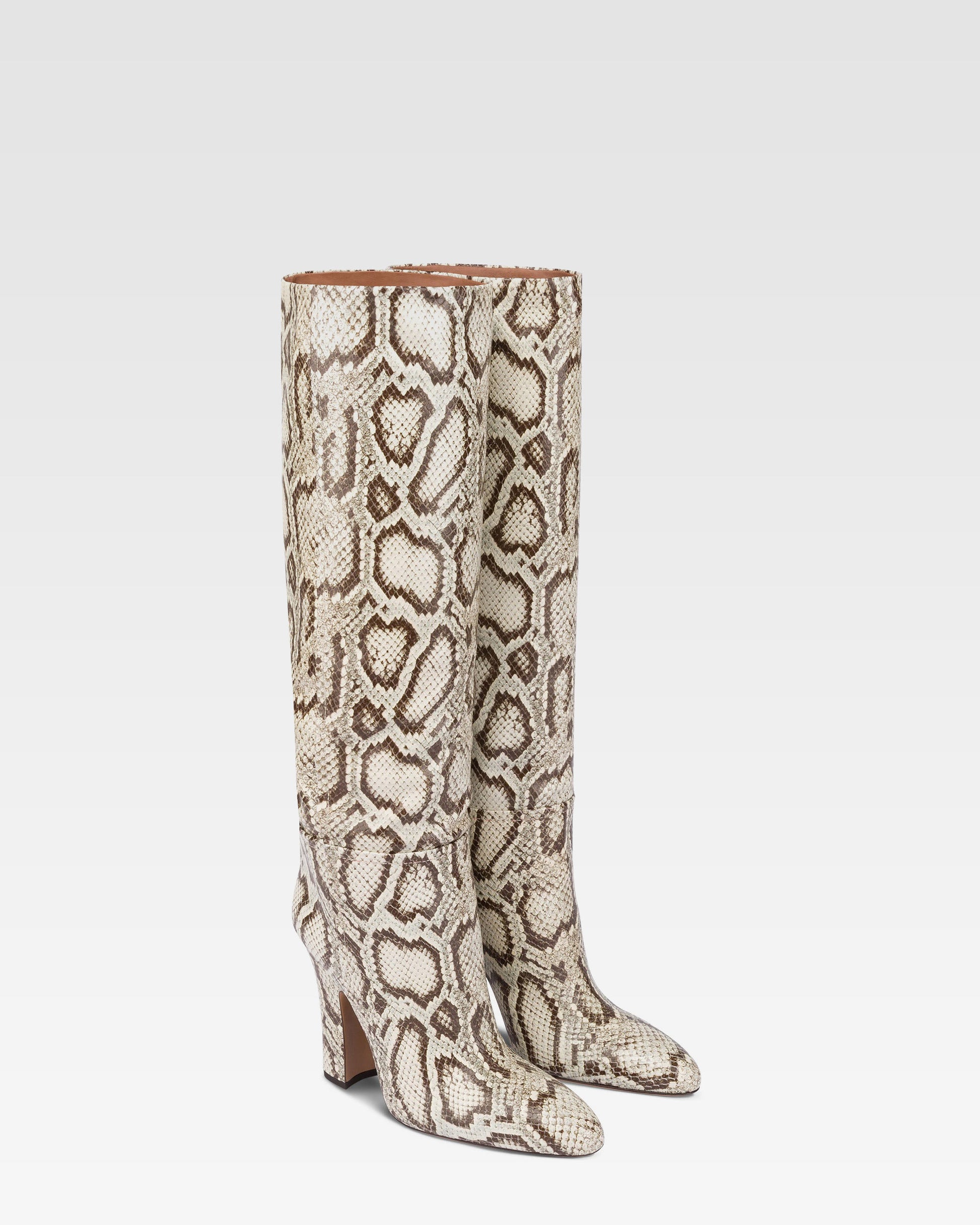 Boots in natural printed python leather