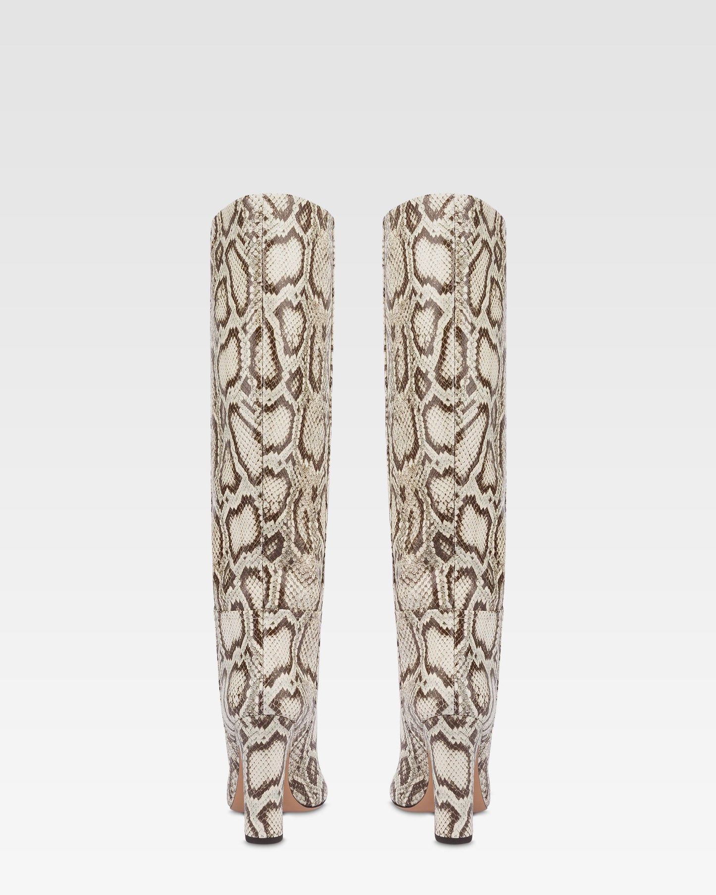 Boots in natural printed python leather