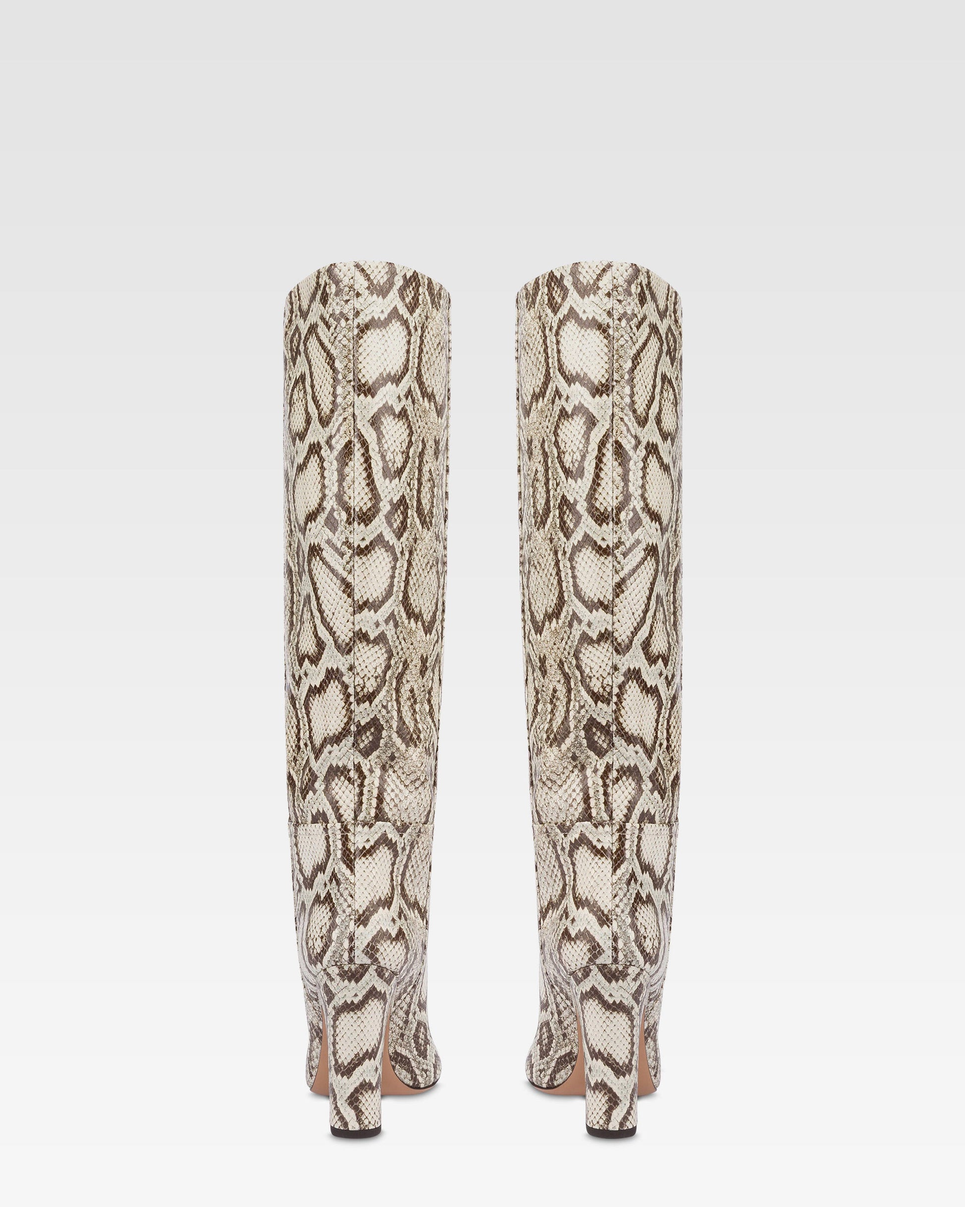 Boots in natural printed python leather