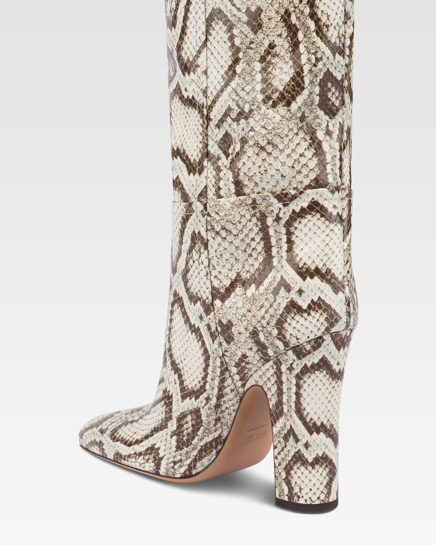 Boots in natural printed python leather