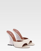 Mules en piel color hueso y plata