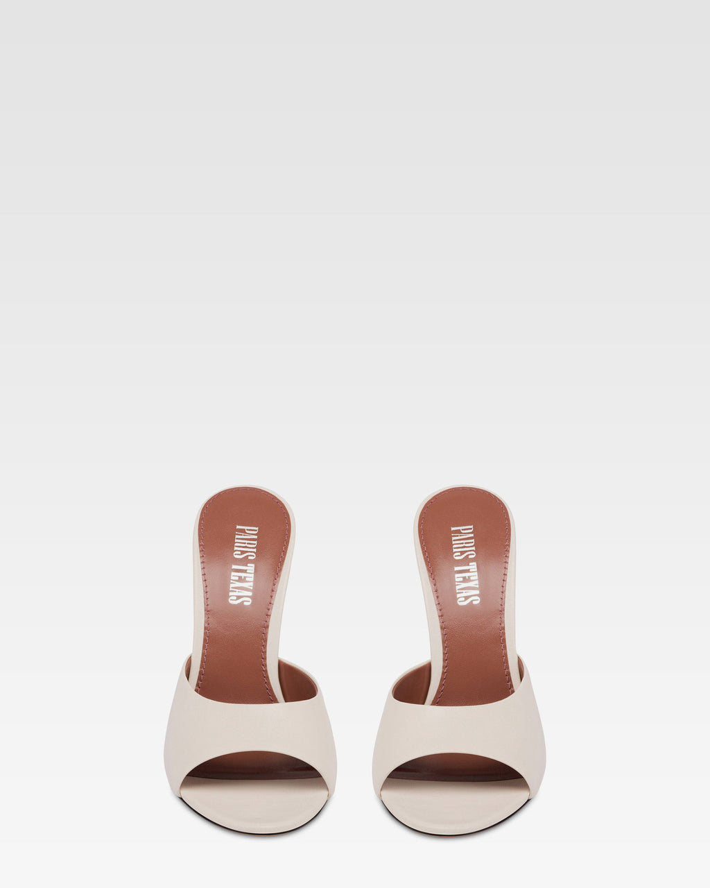 Mules en piel color hueso y plata