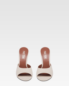 Mules en piel color hueso y plata