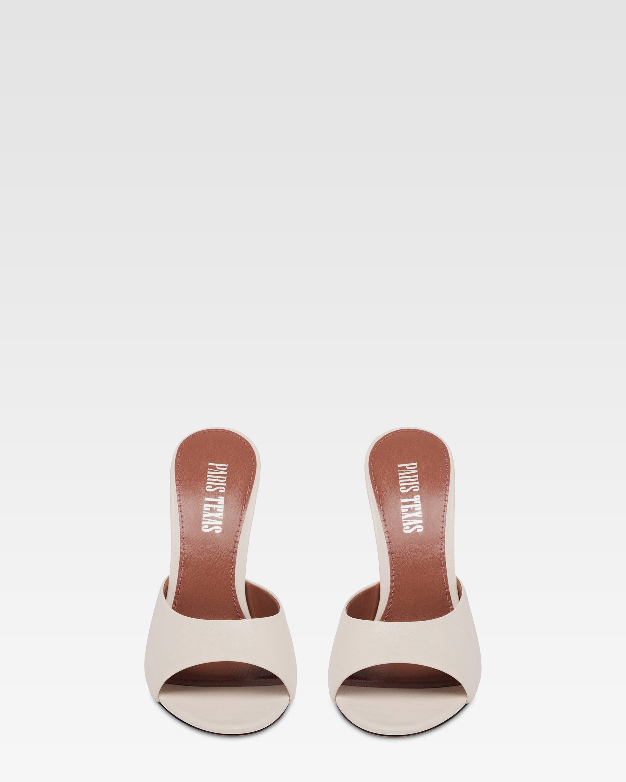 Mules en piel color hueso y plata