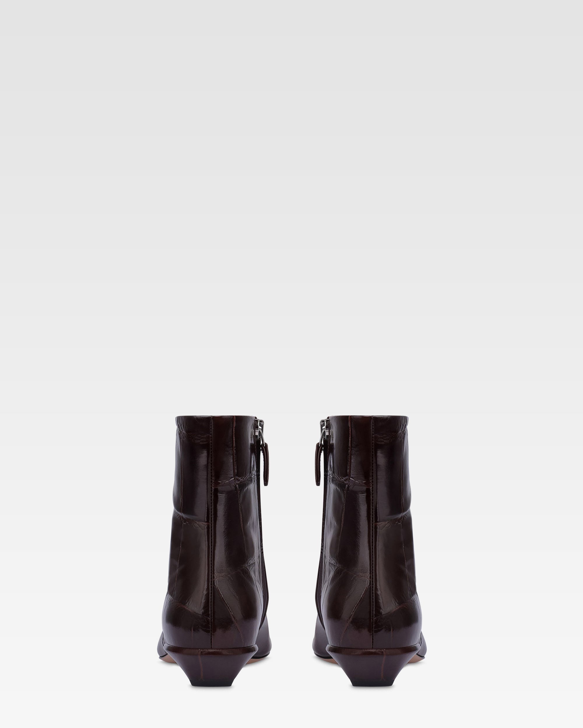 Bottines en cuir croco rouge sombre