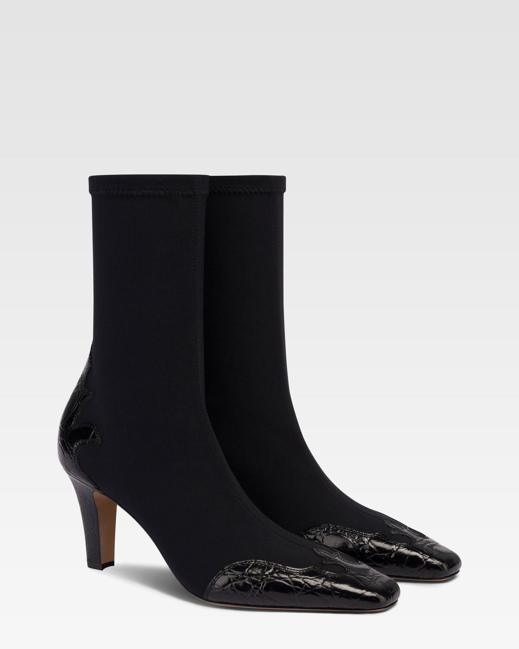 Botas de piel de cocodrilo negra y elastica