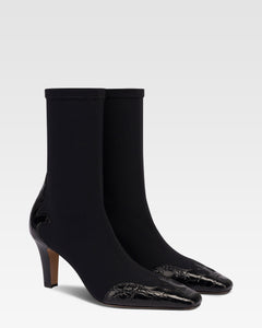 Botas de piel de cocodrilo negra y elastica