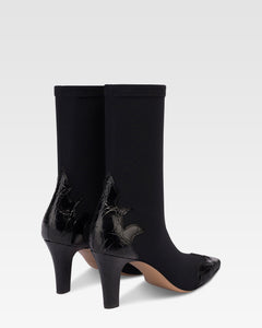 Botas de piel de cocodrilo negra y elastica