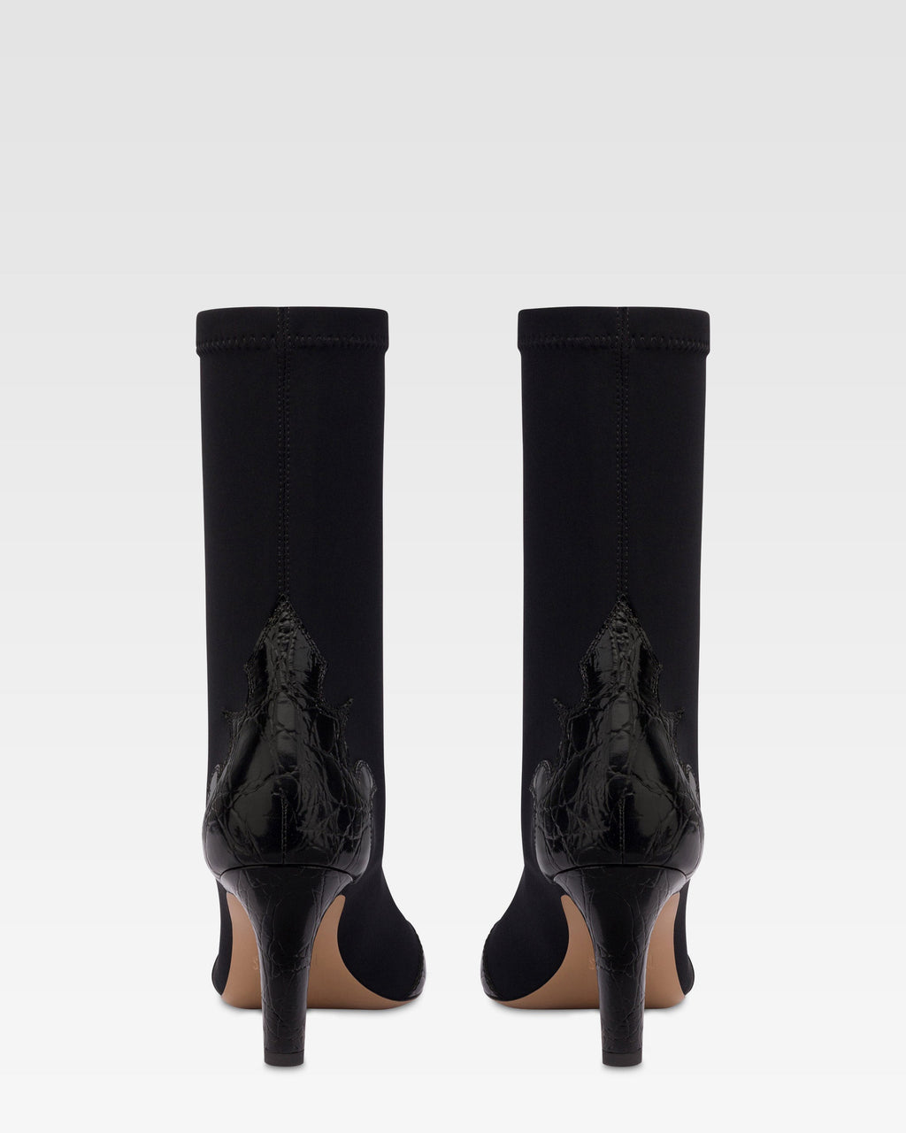 Botas de piel de cocodrilo negra y elastica