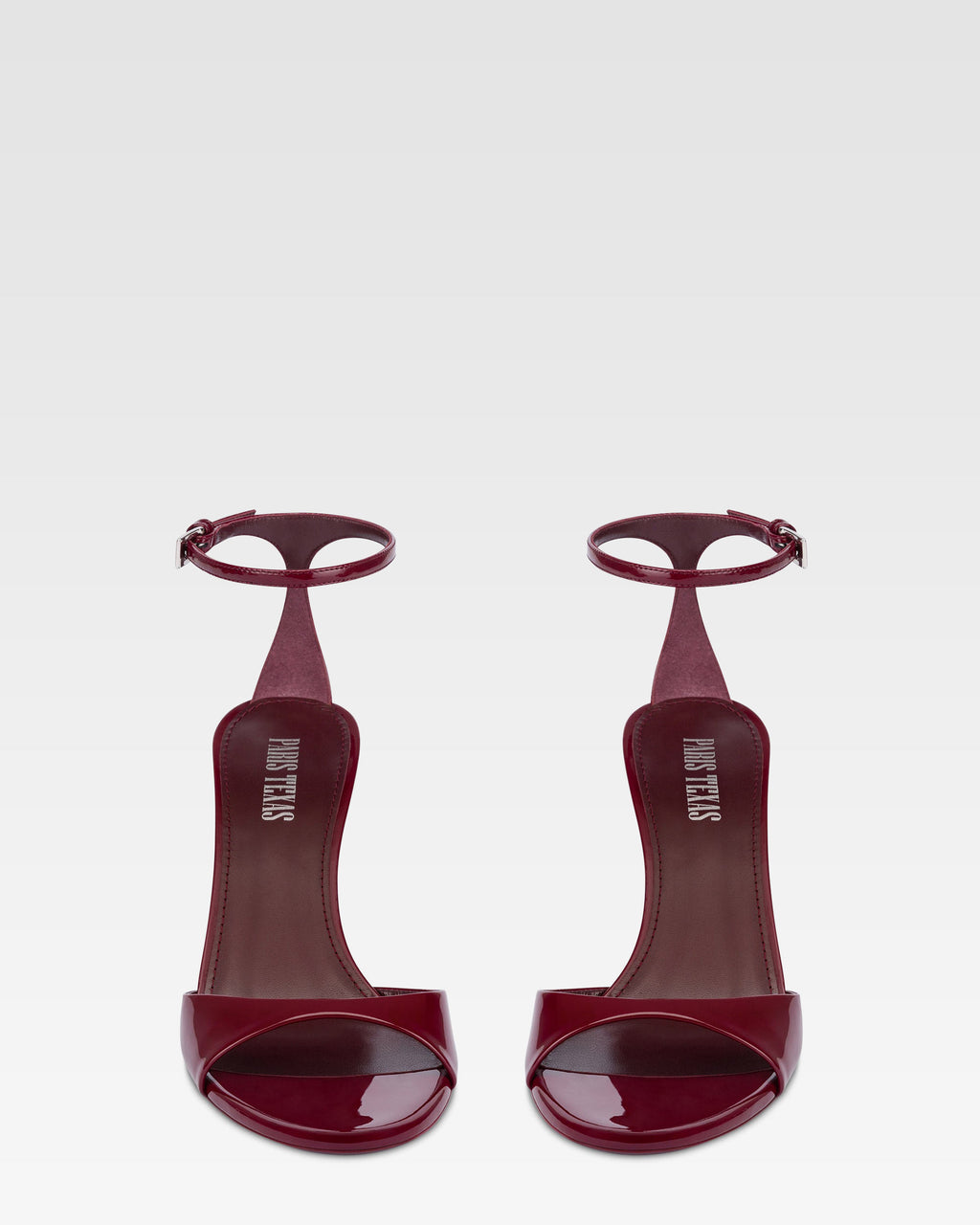 Sandals in rouge noir patent leather
