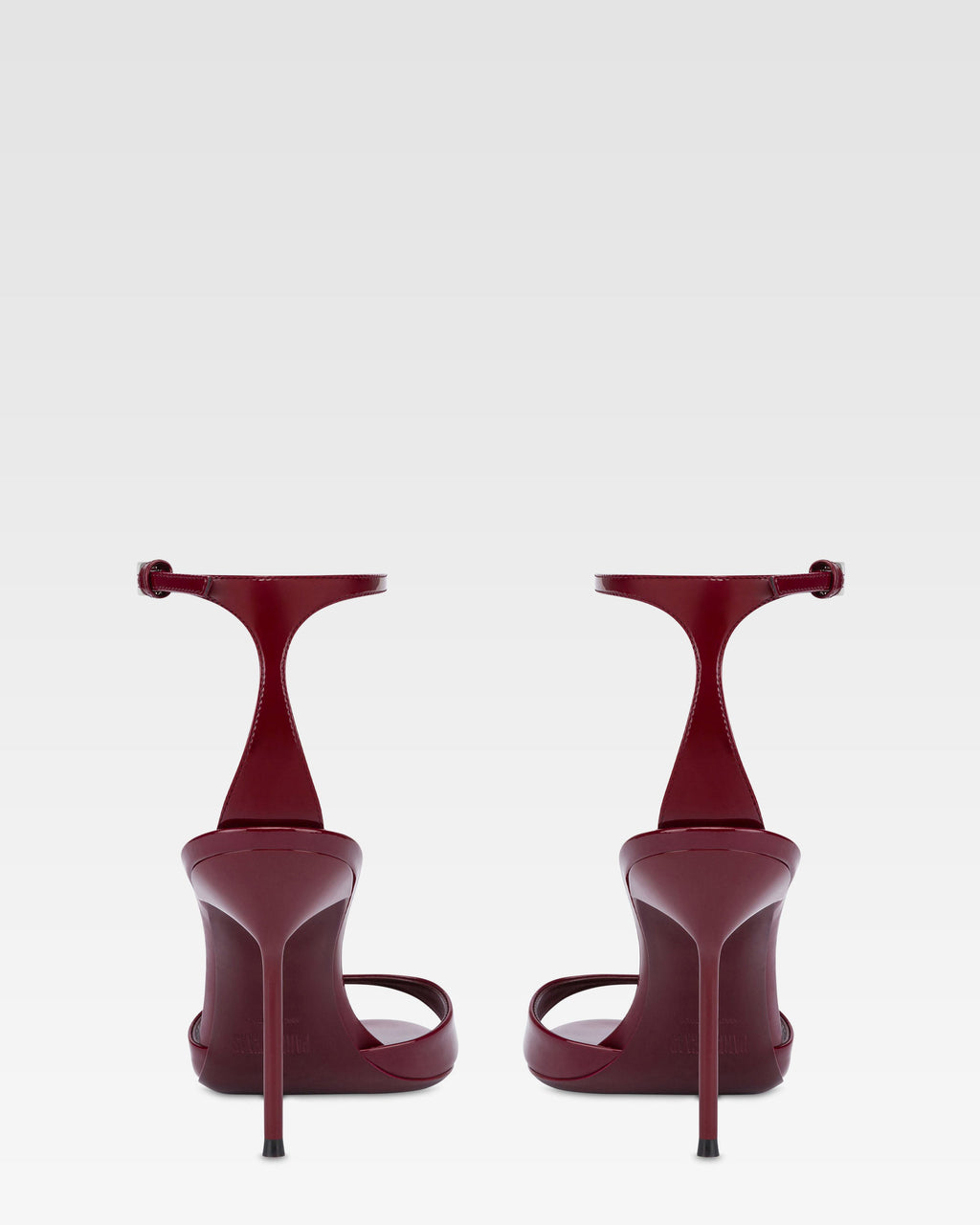 Sandals in rouge noir patent leather