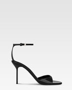 Sandals in black patent leather