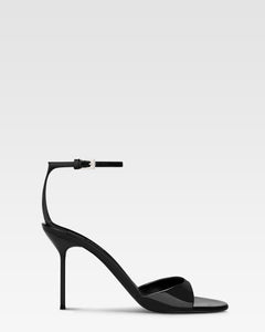 Sandals in black patent leather