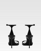 Sandals in black patent leather