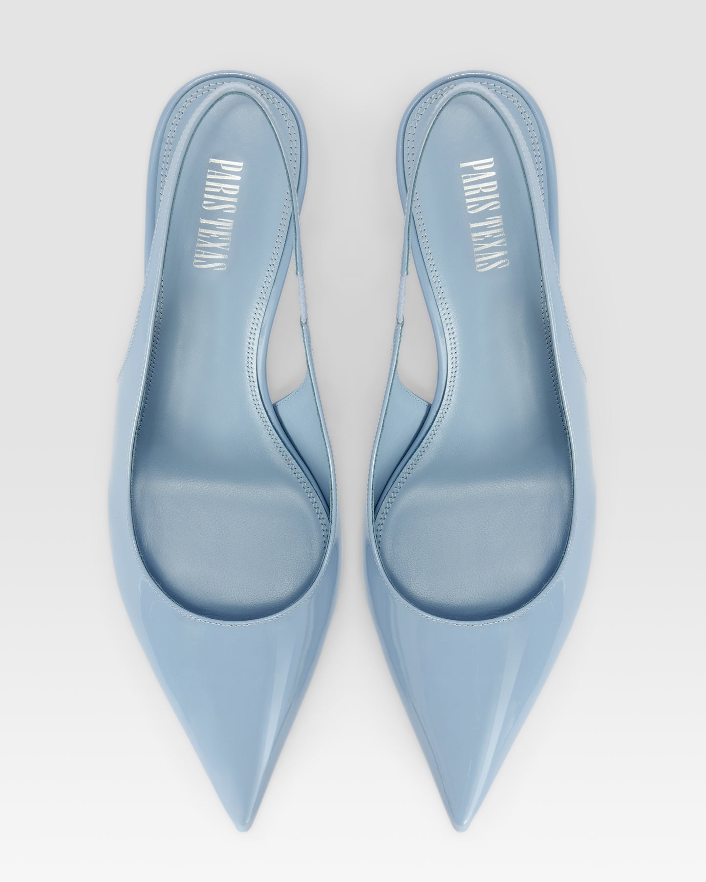 Slingbacks in denim-colored patent leather