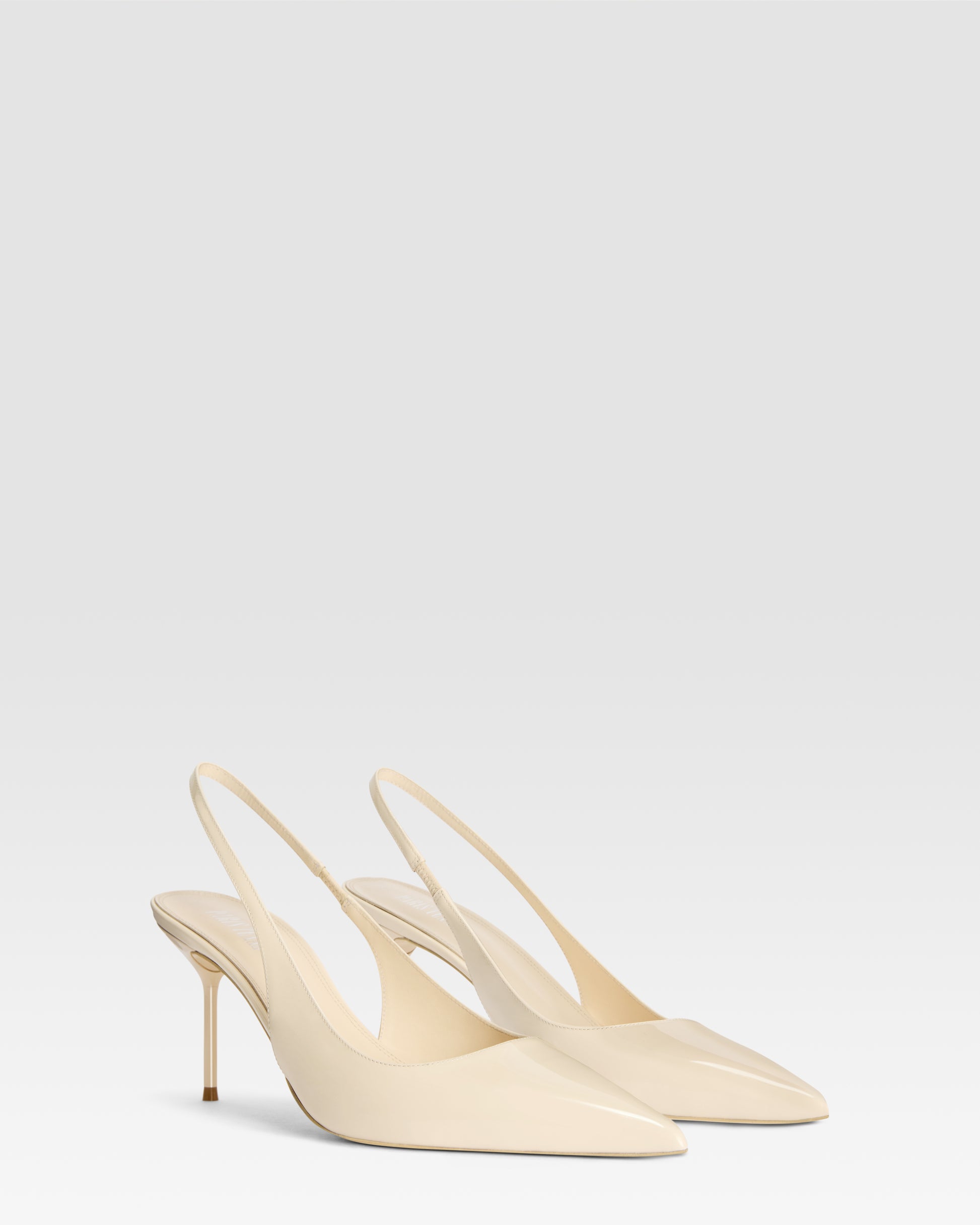 Slingbacks in ivory patent leather