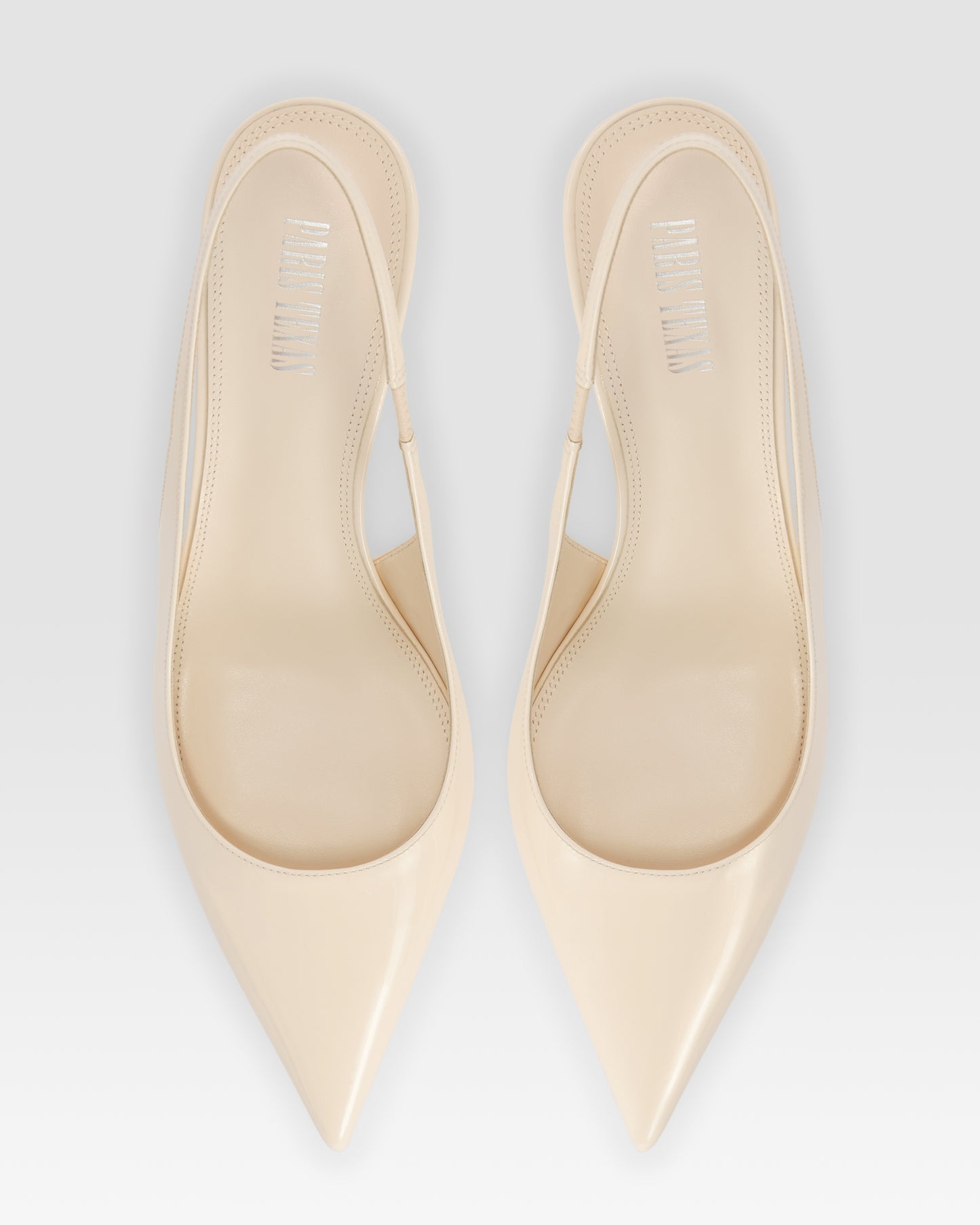 Slingbacks in ivory patent leather