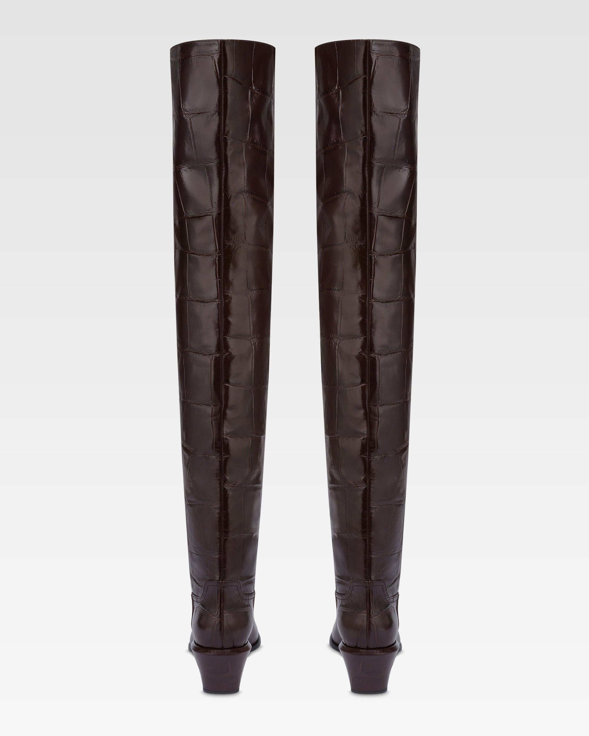 Over-the-knee boots in ebony croco-embossed leather