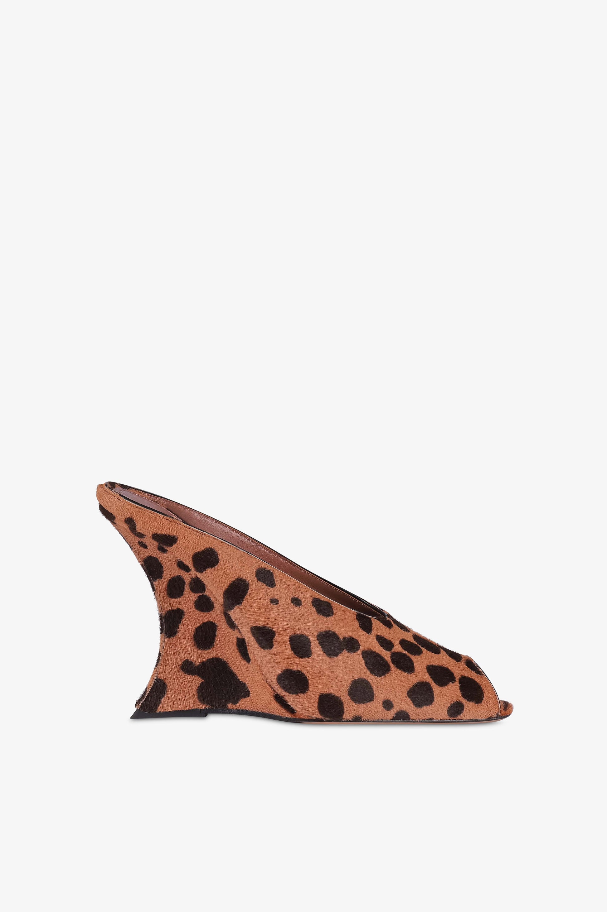 Open-toe sabots in caramel and dark brown printed cowhide