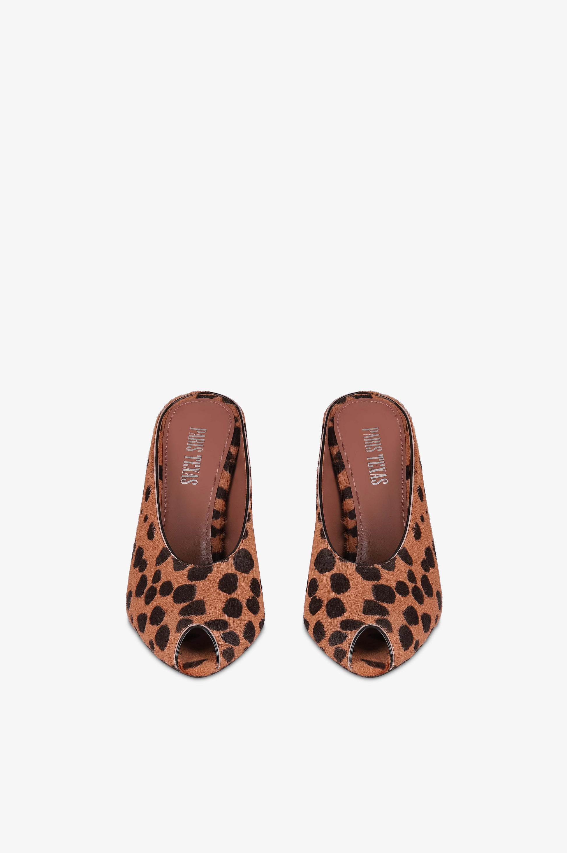 Open-toe sabots in caramel and dark brown printed cowhide