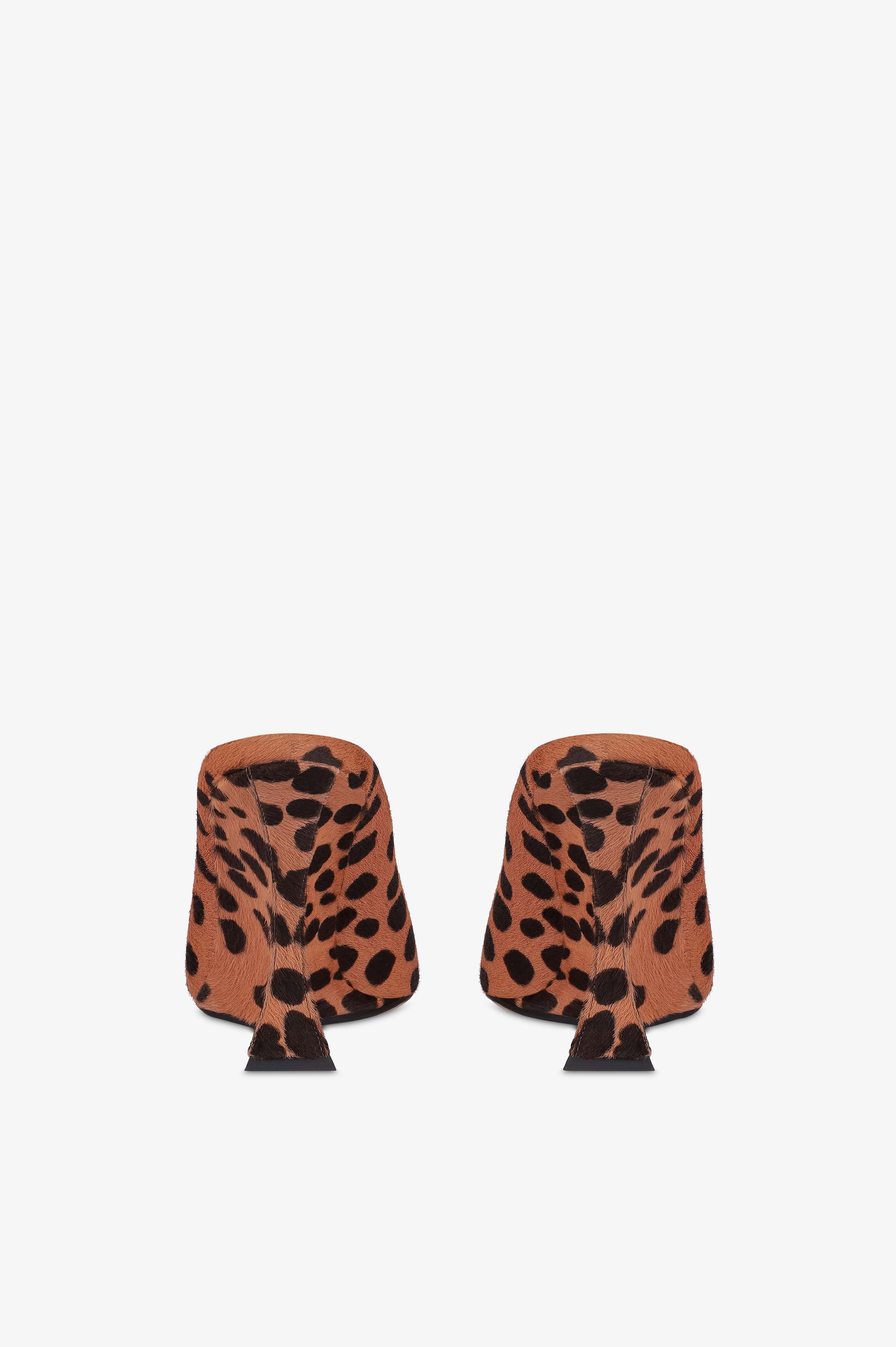 Open-toe sabots in caramel and dark brown printed cowhide