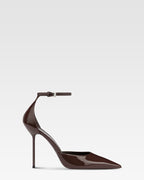 Ankle-strap pumps in ebony patent leather