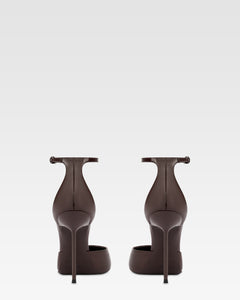 Ankle-strap pumps in ebony patent leather