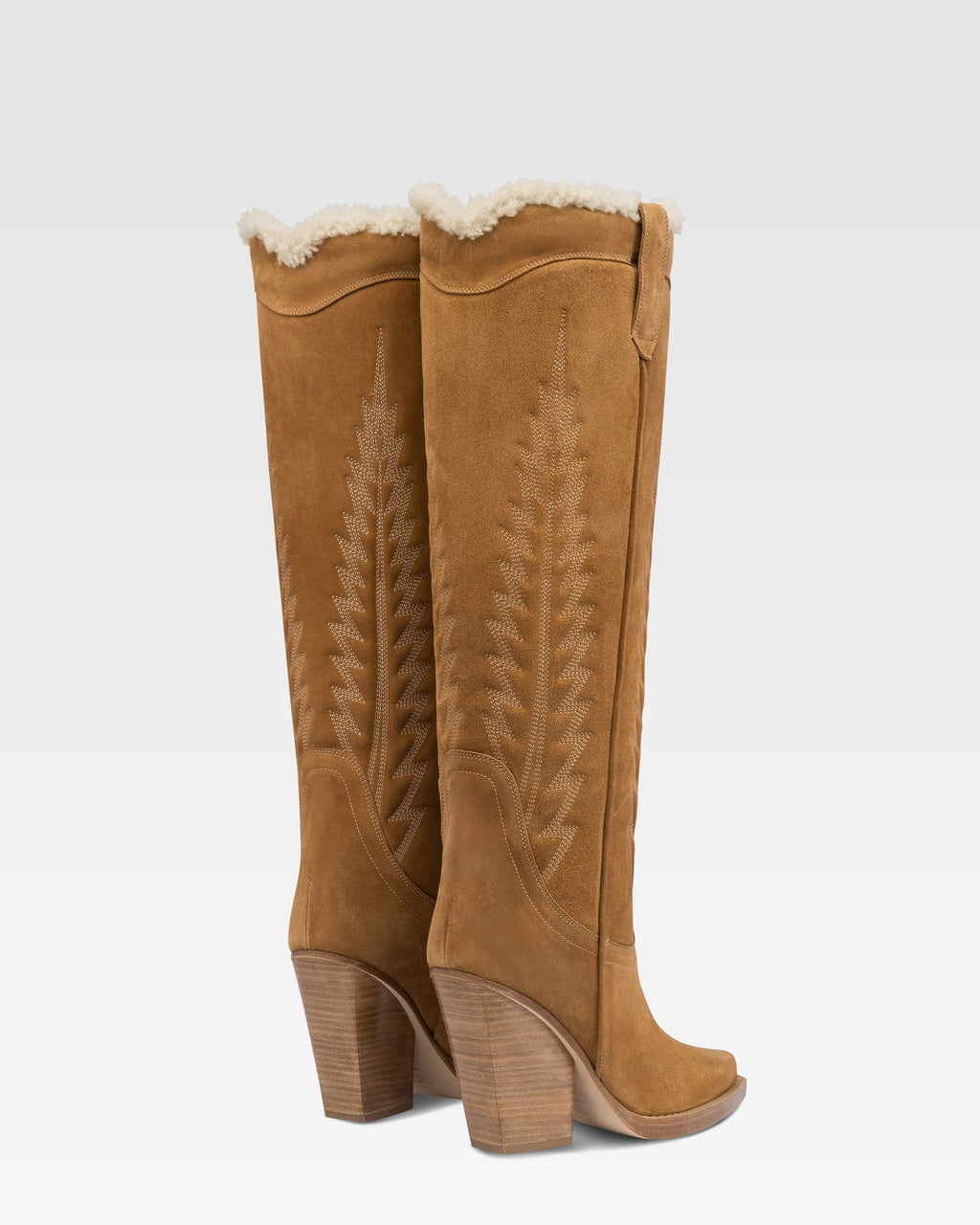 Texanische Stiefel aus beigem Kalbsveloursleder.