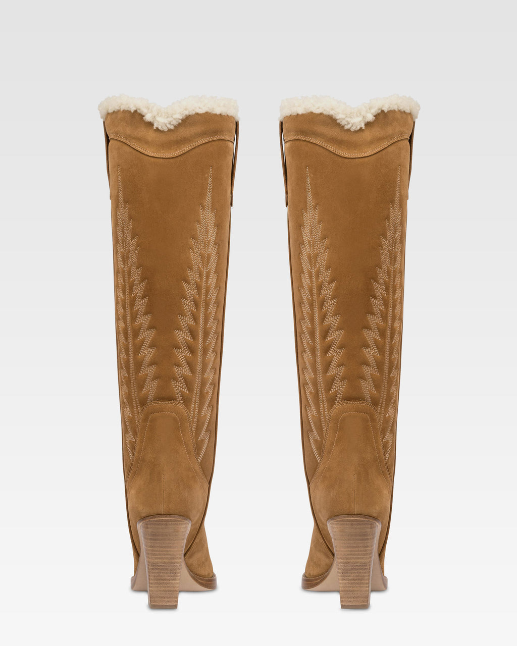 Texanische Stiefel aus beigem Kalbsveloursleder.