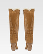 Texanische Stiefel aus beigem Kalbsveloursleder.