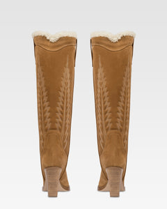 Texanische Stiefel aus beigem Kalbsveloursleder.