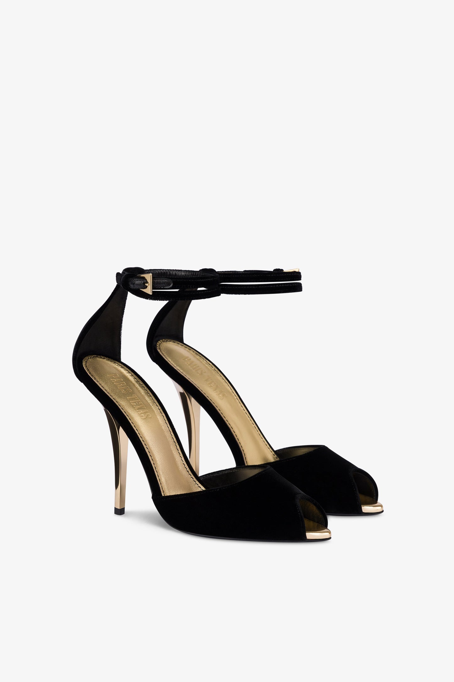 Sandals in black velvet with gold detailing.