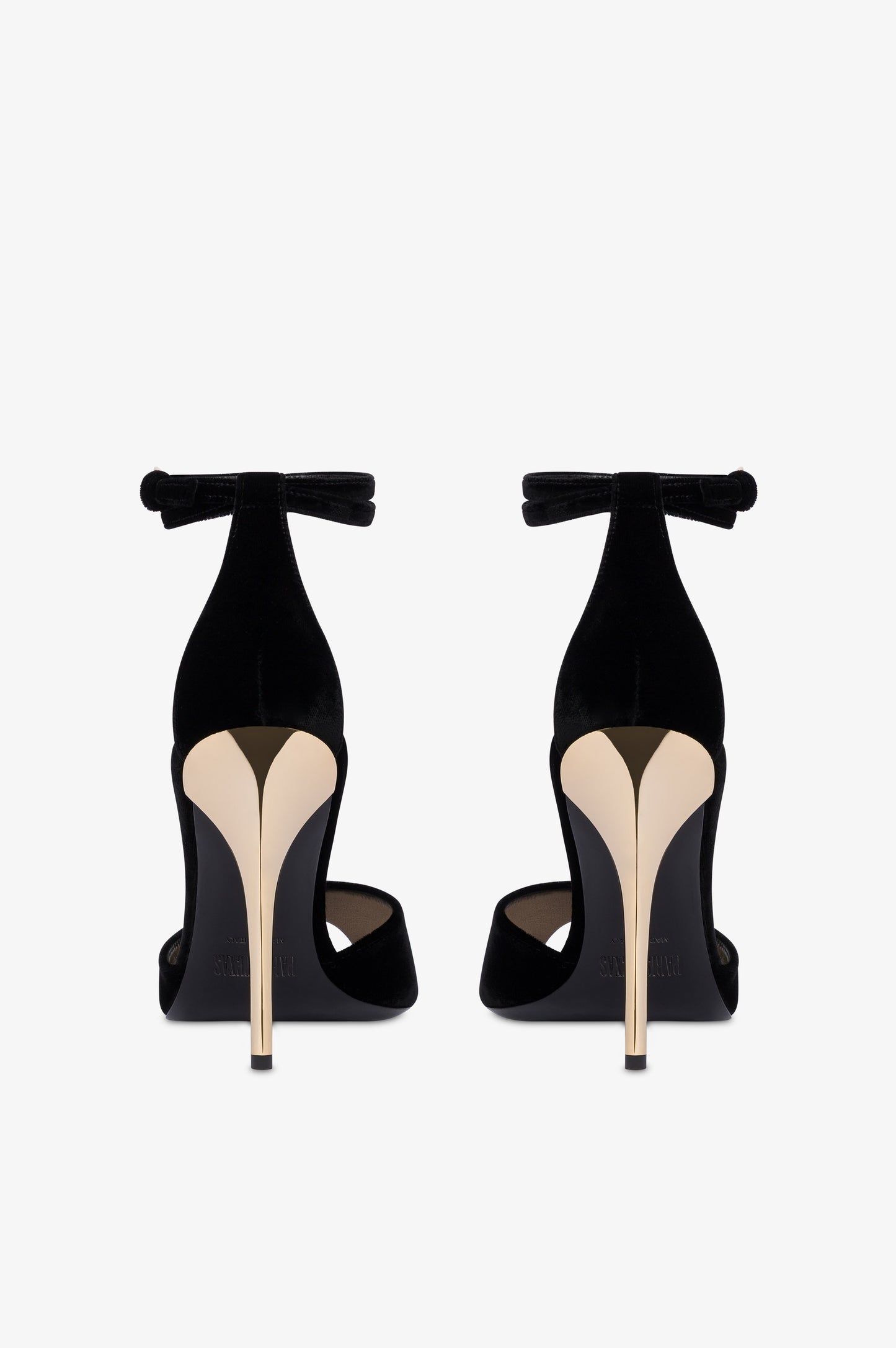 Sandals in black velvet with gold detailing.